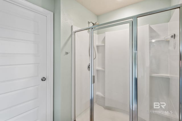 2526 E Windmere Dr, Semmes, AL 36575 - full bathroom with a stall shower