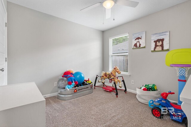 2526 E Windmere Dr, Semmes, AL 36575 - recreation room with carpet flooring, ceiling fan, and baseboards