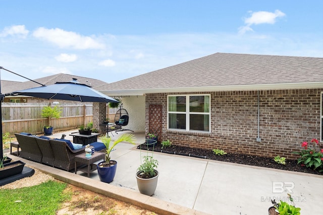 2526 E Windmere Dr, Semmes, AL 36575 - view of patio / terrace with an outdoor living space and fence