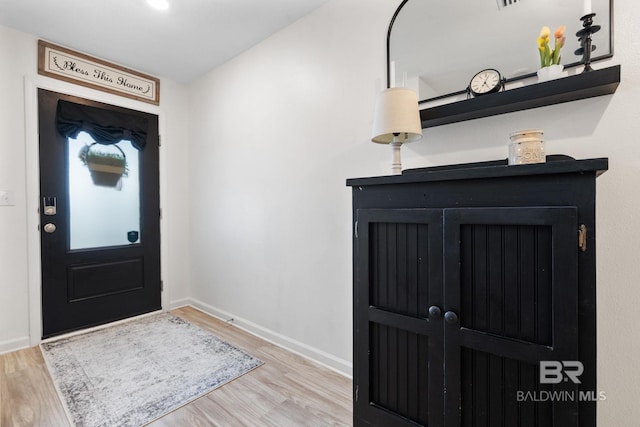 2526 E Windmere Dr, Semmes, AL 36575 - entrance foyer with wood finished floors and baseboards