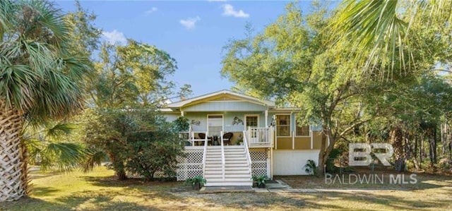 414 Audubon Dr, Dauphin Island, AL 36528 - view of front facade featuring stairs