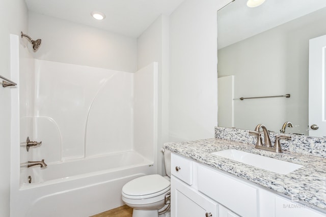 full bathroom with shower / washtub combination, vanity, and toilet