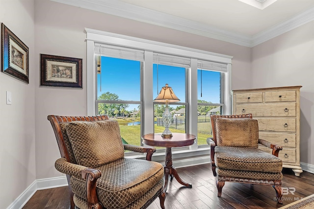 living area with dark wood-style floors, baseboards, and crown molding