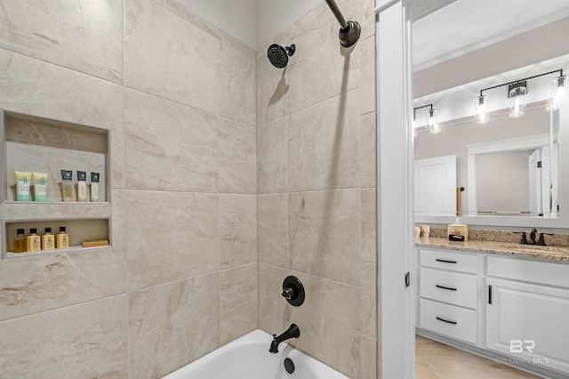 full bathroom with washtub / shower combination and vanity