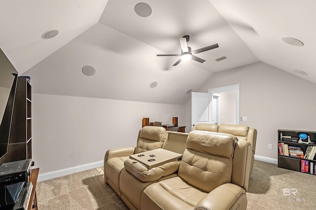 carpeted cinema featuring a ceiling fan, visible vents, vaulted ceiling, and baseboards