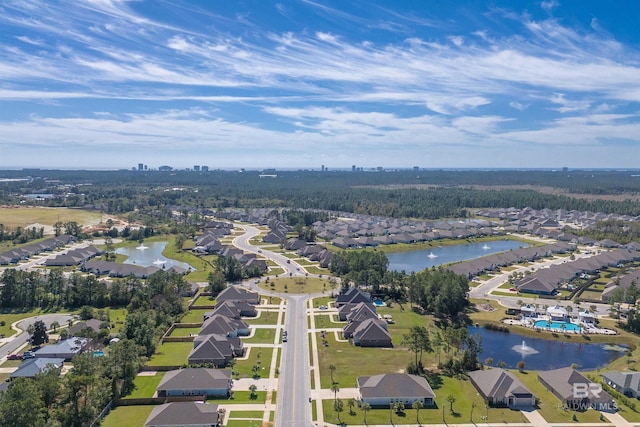 bird's eye view featuring a residential view and a water view