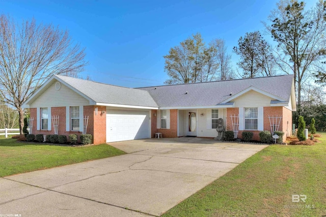 single story home featuring a garage and a front yard