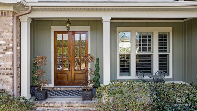 entrance to property with french doors and brick siding