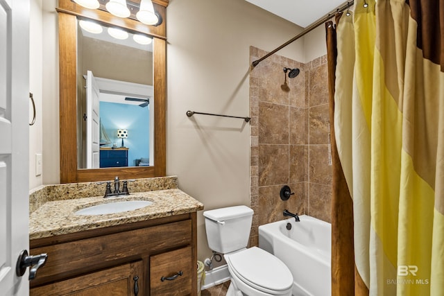 bathroom featuring vanity, toilet, and shower / bathtub combination with curtain