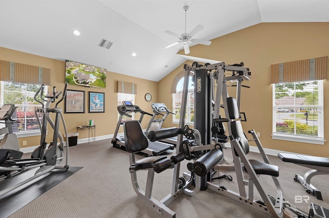 gym with ceiling fan and lofted ceiling