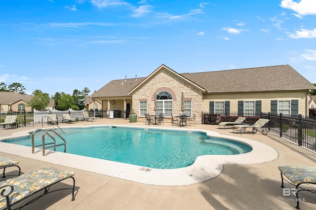 view of pool with a patio area