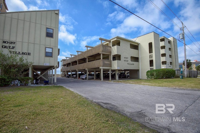 view of property with covered parking