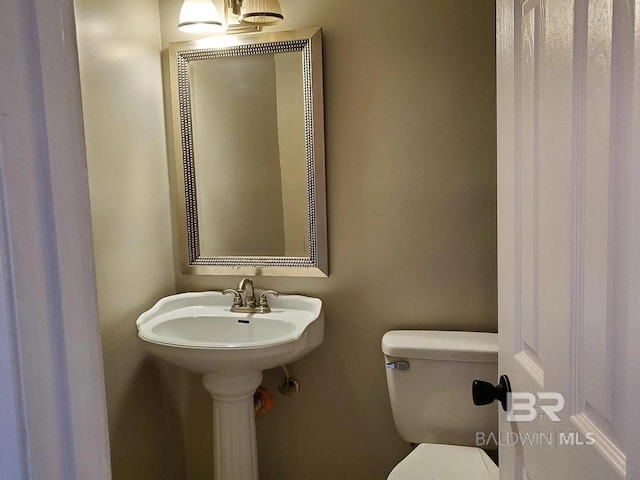 half bathroom with toilet