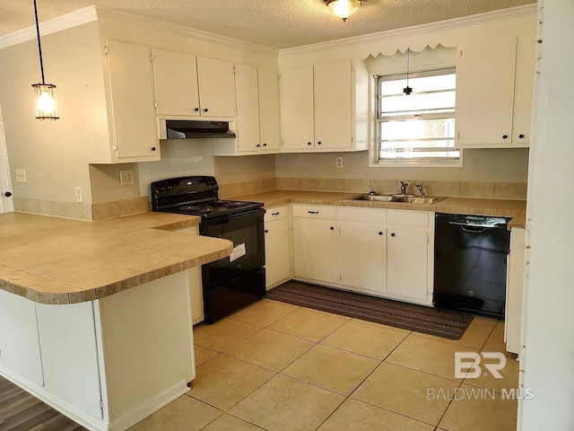 kitchen with black appliances, under cabinet range hood, a peninsula, a sink, and white cabinetry