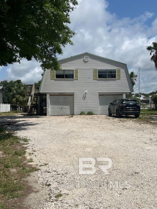 26225 Marina Rd, Orange Beach, AL 36561 - view of home's exterior with an attached garage