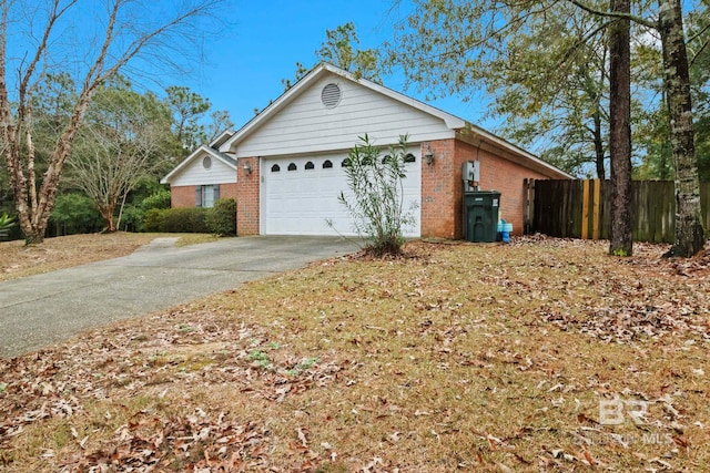 view of side of home with a garage