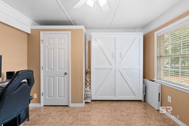 tiled office featuring radiator heating unit, ceiling fan, and crown molding