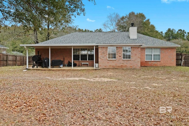 rear view of house featuring a patio area