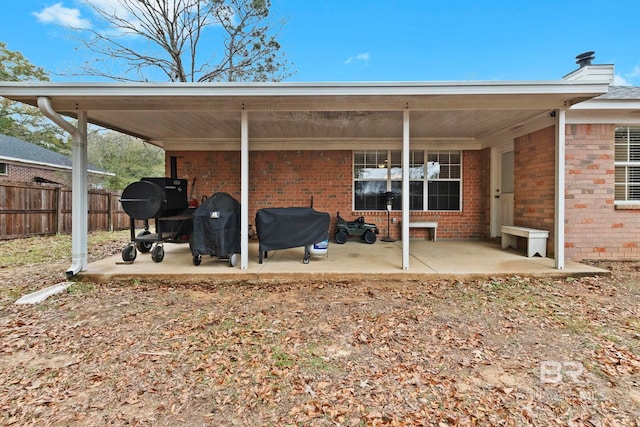 back of property featuring a patio area