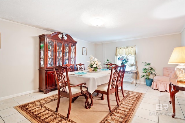 dining space with crown molding, light tile patterned flooring, and a textured ceiling