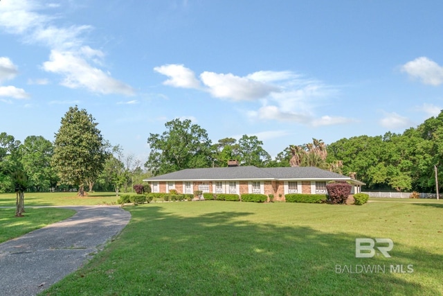 1180 Dawes Rd, Mobile, AL 36695 - view of front facade with a chimney and a front yard