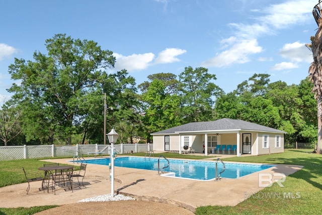 1180 Dawes Rd, Mobile, AL 36695 - view of swimming pool with a yard, fence, an outbuilding, and a patio area
