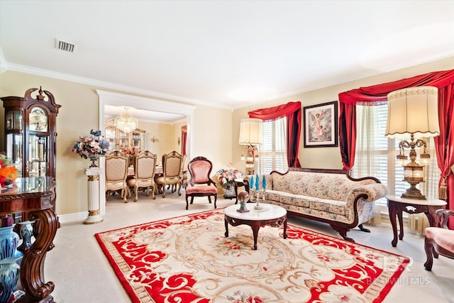 carpeted living room with crown molding and a notable chandelier