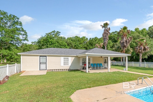 1180 Dawes Rd, Mobile, AL 36695 - back of house featuring a fenced backyard, roof with shingles, a ceiling fan, a patio area, and a yard