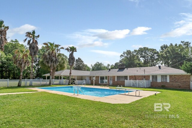 1180 Dawes Rd, Mobile, AL 36695 - view of pool featuring a fenced in pool, a lawn, and fence