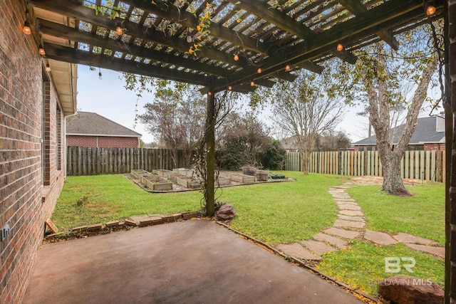 view of yard featuring a patio area, a fenced backyard, and a pergola