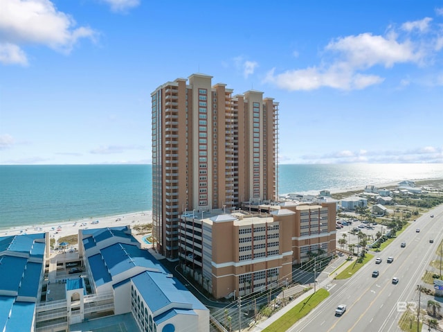 bird's eye view with a view of the beach and a water view