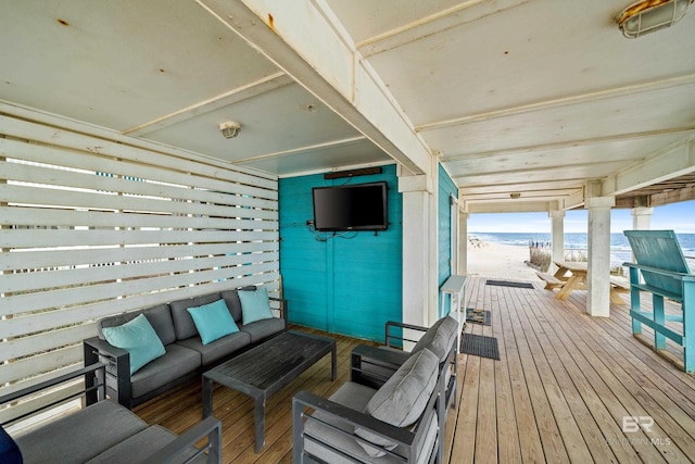 wooden deck with an outdoor hangout area