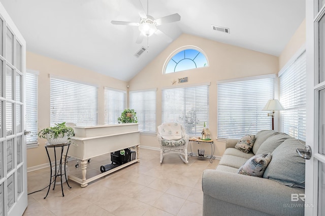 sunroom / solarium with ceiling fan and lofted ceiling