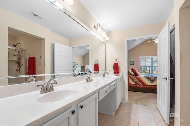 bathroom featuring tile patterned floors and vanity