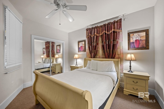 bedroom with baseboards, carpet, and ceiling fan