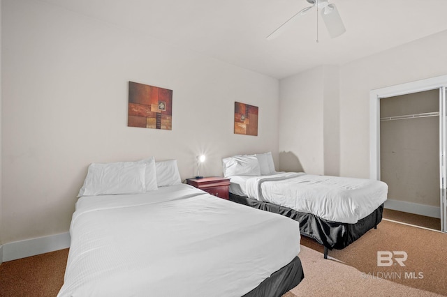 bedroom featuring a ceiling fan, baseboards, a closet, and carpet floors