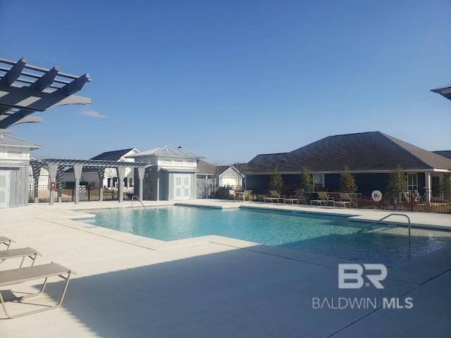 view of swimming pool with a pergola and a patio area