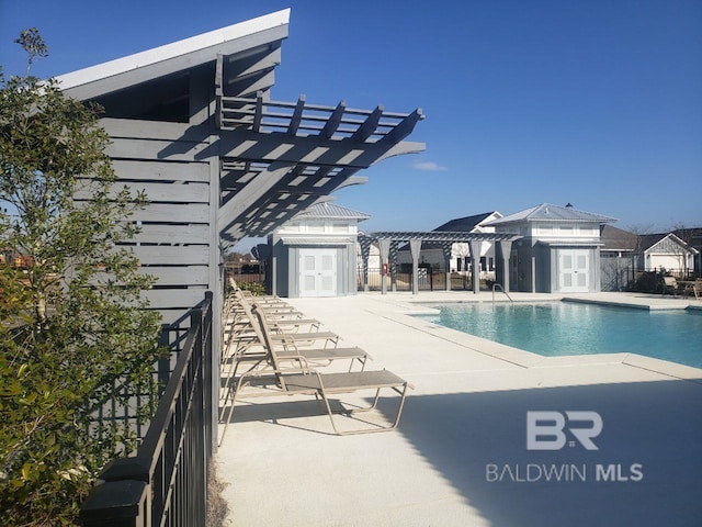 view of pool featuring a patio and a pergola