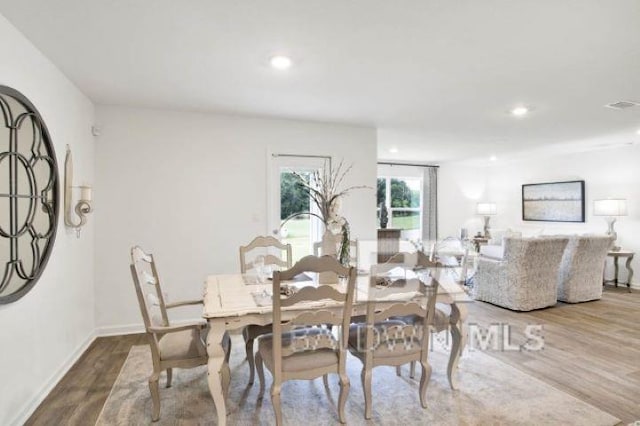 dining room featuring hardwood / wood-style flooring