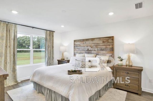 bedroom featuring light hardwood / wood-style flooring