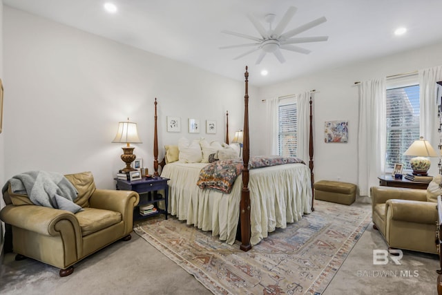 bedroom with light colored carpet and recessed lighting