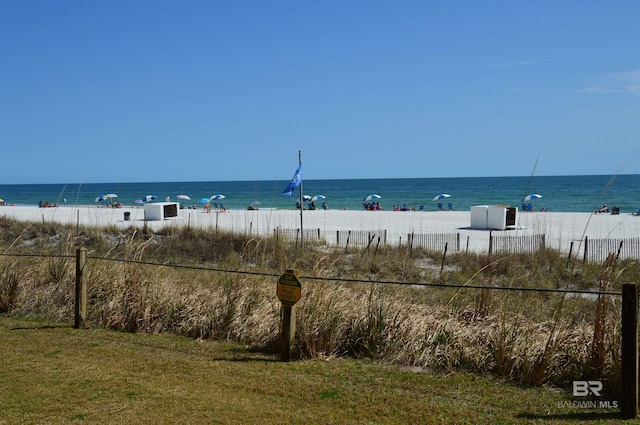 view of water feature with fence