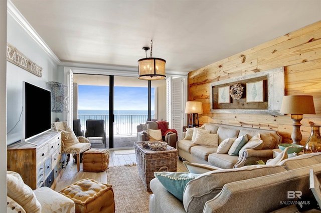 24900 Perdido Beach Blvd Unit 402, Orange Beach, AL 36561 - living area with crown molding, floor to ceiling windows, wood walls, and hardwood / wood-style floors