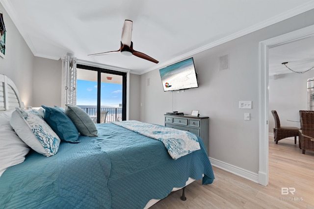 bedroom with access to exterior, ceiling fan, expansive windows, light wood-type flooring, and ornamental molding