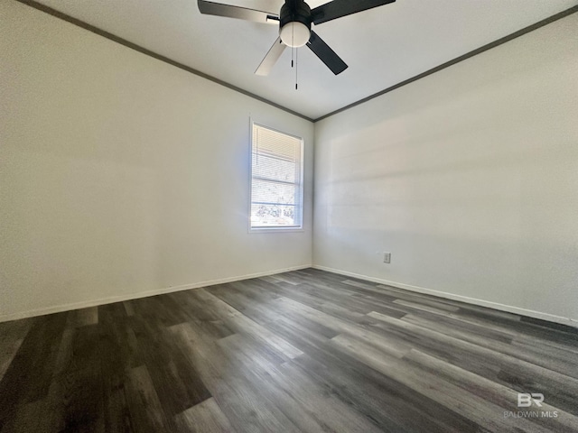 unfurnished room with ceiling fan, dark hardwood / wood-style flooring, and ornamental molding