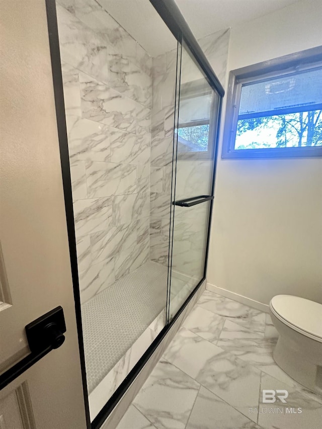 bathroom with toilet and tiled shower