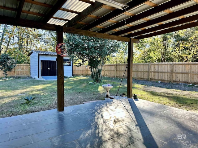 view of patio / terrace with a storage unit