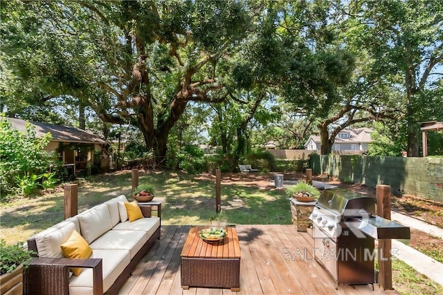 wooden terrace featuring an outdoor hangout area