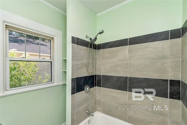 bathroom featuring tiled shower / bath combo and ornamental molding