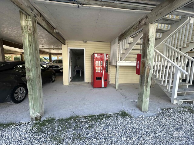 garage featuring a carport